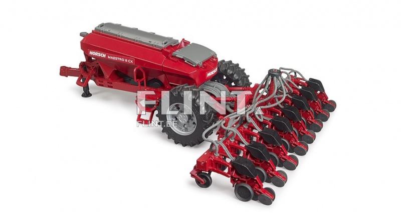A red agricultural machine featuring a large tank at the front and multiple planting rows at the back. It has wide wheels with a robust tread for good traction and stability. The design is modern and functional.