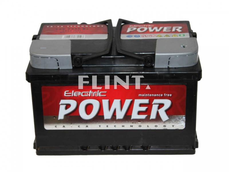 A large black electric battery with a red label that reads 'Electric POWER'. It has two gray covers on top and is labeled as maintenance-free.