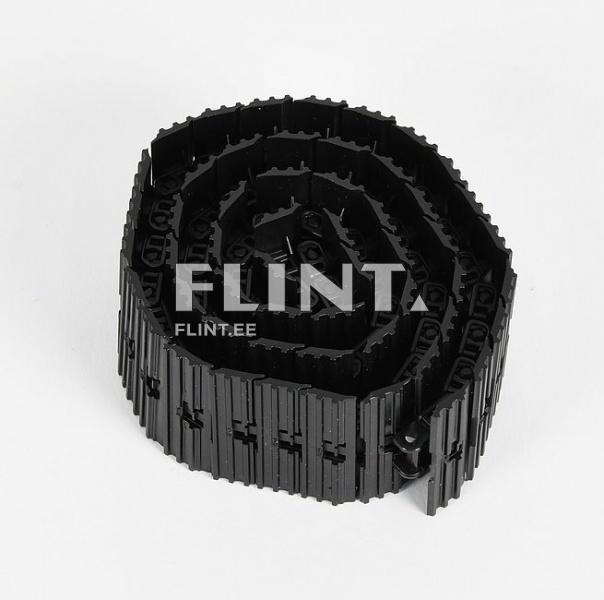 A black plastic component is rolled into a spiral shape, featuring clearly visible links in each section.