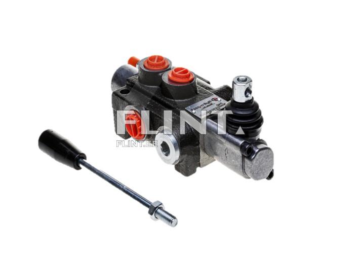 The image shows a hydraulic valve featuring two red buttons and a black connector. The valve has a dark metal body with silver components. At the bottom left, there is a cylindrical tool with a black plastic cover, connected to a metal connector and a screw.