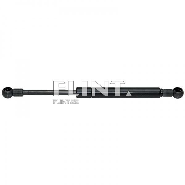 The product is a black gas spring with rubber connectors on both ends. It has a straight, cylindrical shape.