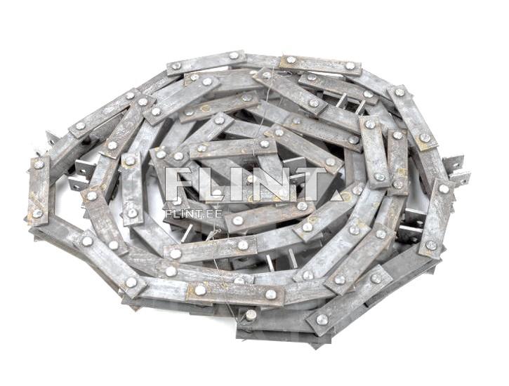 The product is a metal spiral with sharp edges and an oval shape. The structure consists of flat pieces connected by bolts. The surface shows signs of rust, giving it a used appearance.